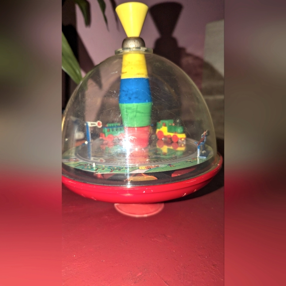 Simm humming railroad Vintage tin spinning top